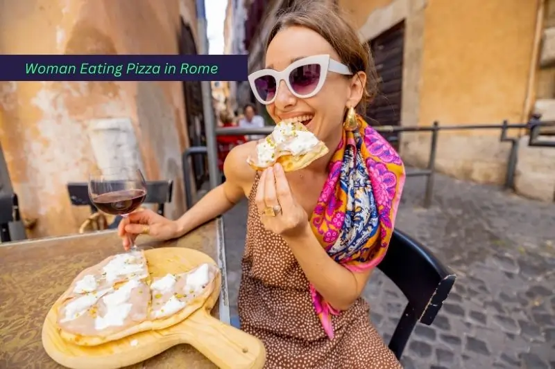 Farm Tours from Rome, Woman Eating Pizza at Italian Restaurant Outdoors